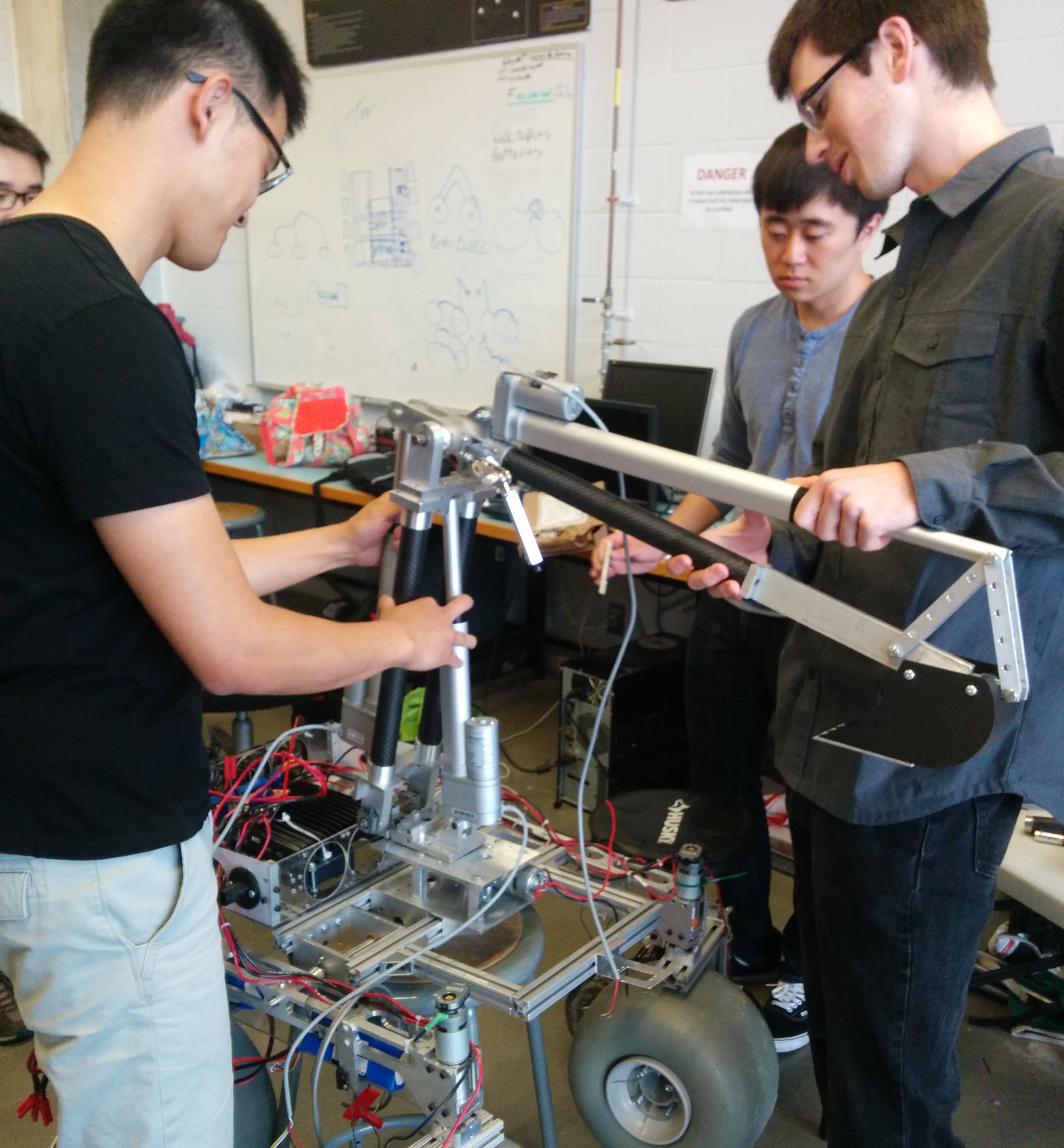 Robotics team members, working on the Mars Rover