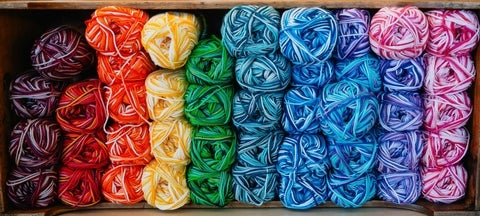 box of multi-coloured yarn