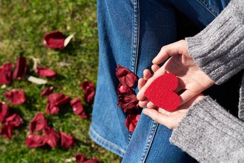 Hands holding a heart