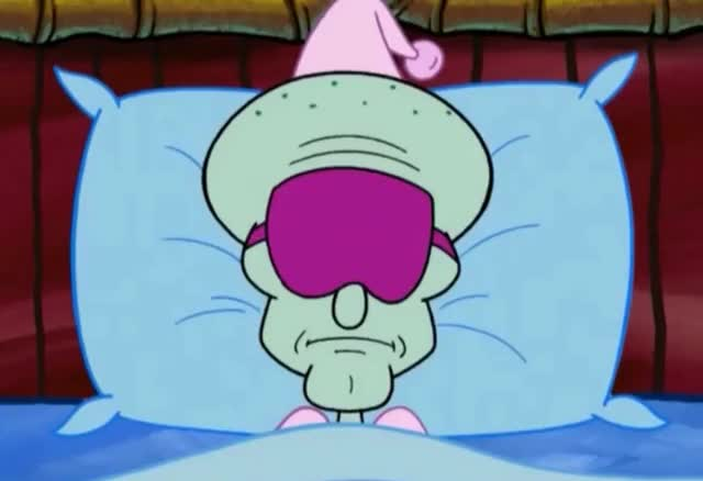 squidward wearing a sleep mask