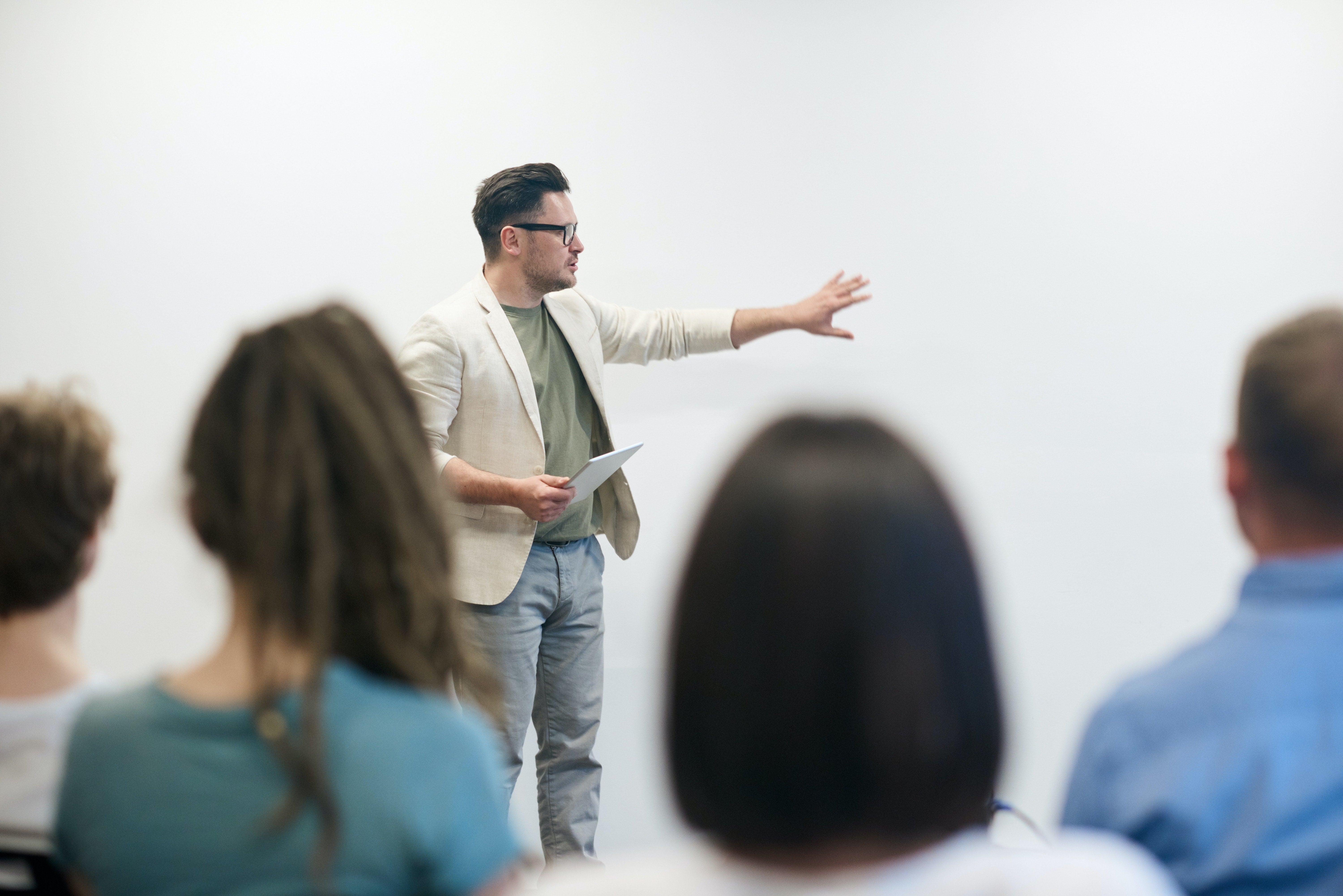 man in front of students 