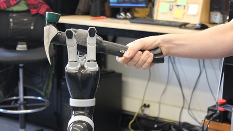 Robot arm with hammer