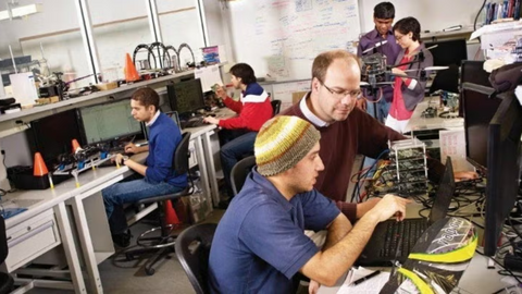 People in lab with computer