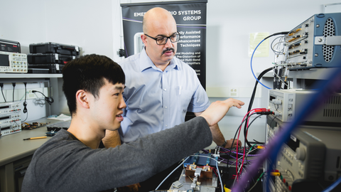 two people with RF machine