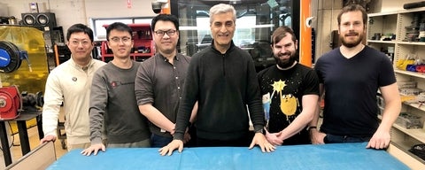 Dr. Amir Khajepour and members if his research team.