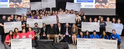 Students with cheques