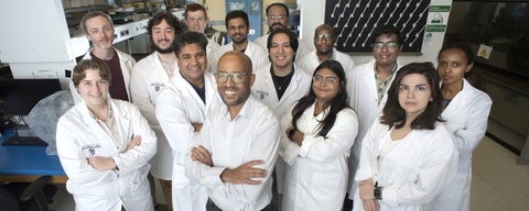 Dr. Tizazu Mekonnen with members of his lab.