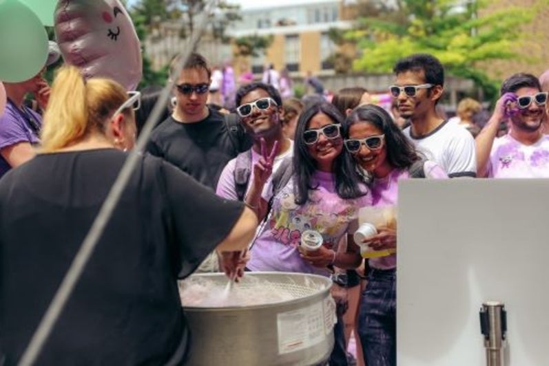 Group of students getting cotton candy