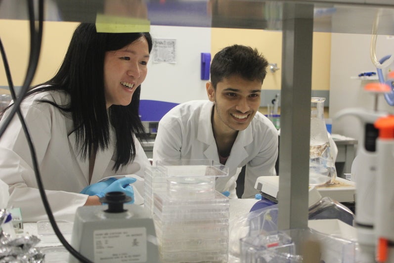 Student and professor in lab