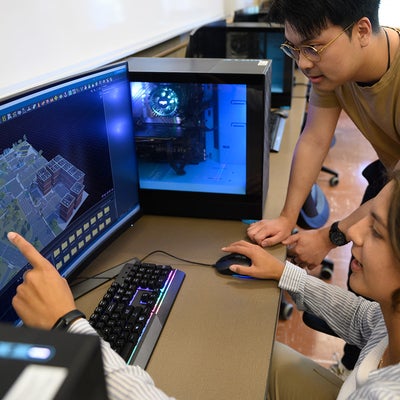 Students looking at transportation map