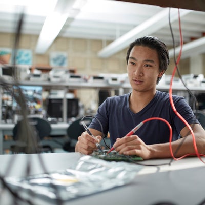 Student working in electronics lab