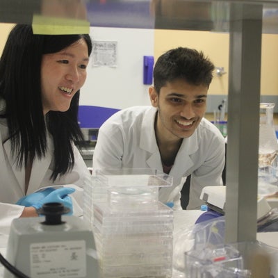 Student and professor in lab