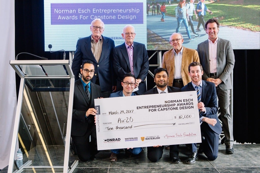 Winning members of Air20 pose with Esch trustees