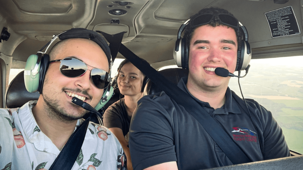 Three people in a plane together, flying