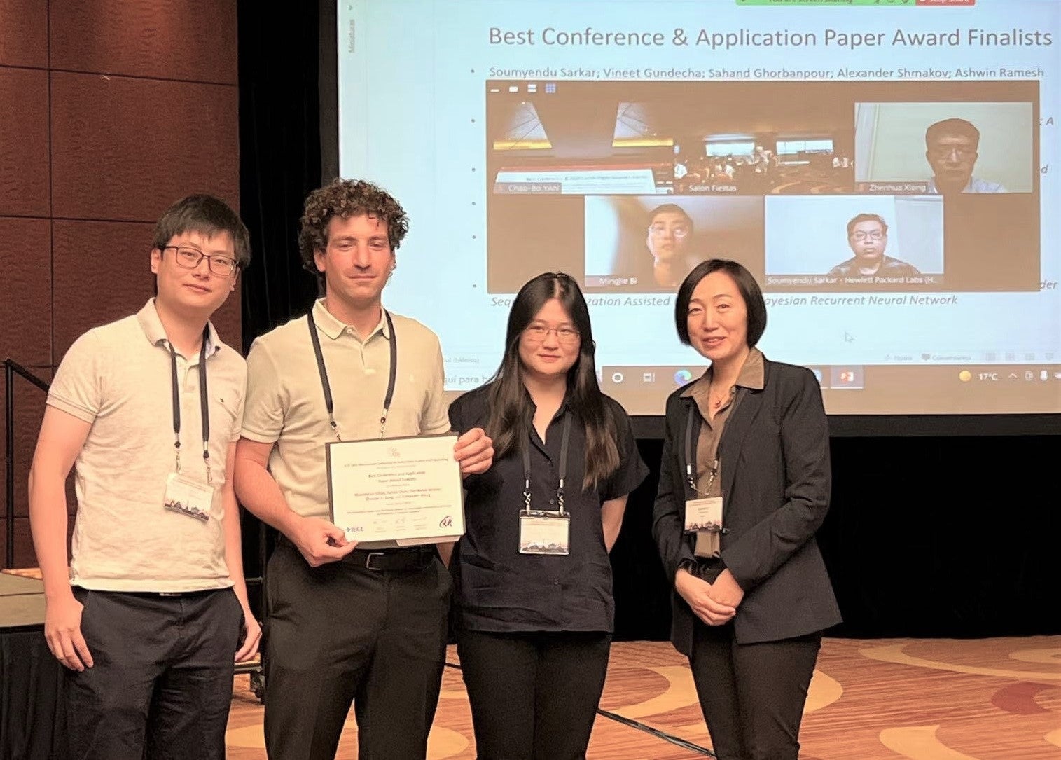 Yuhao Chen (left) and Emily ZhiXuan Zeng(second from right) of Waterloo Engineering pose with German collaborator Maximillian Gilles (second from left) at a conference in Mexico City where they were finalists for a best paper award.