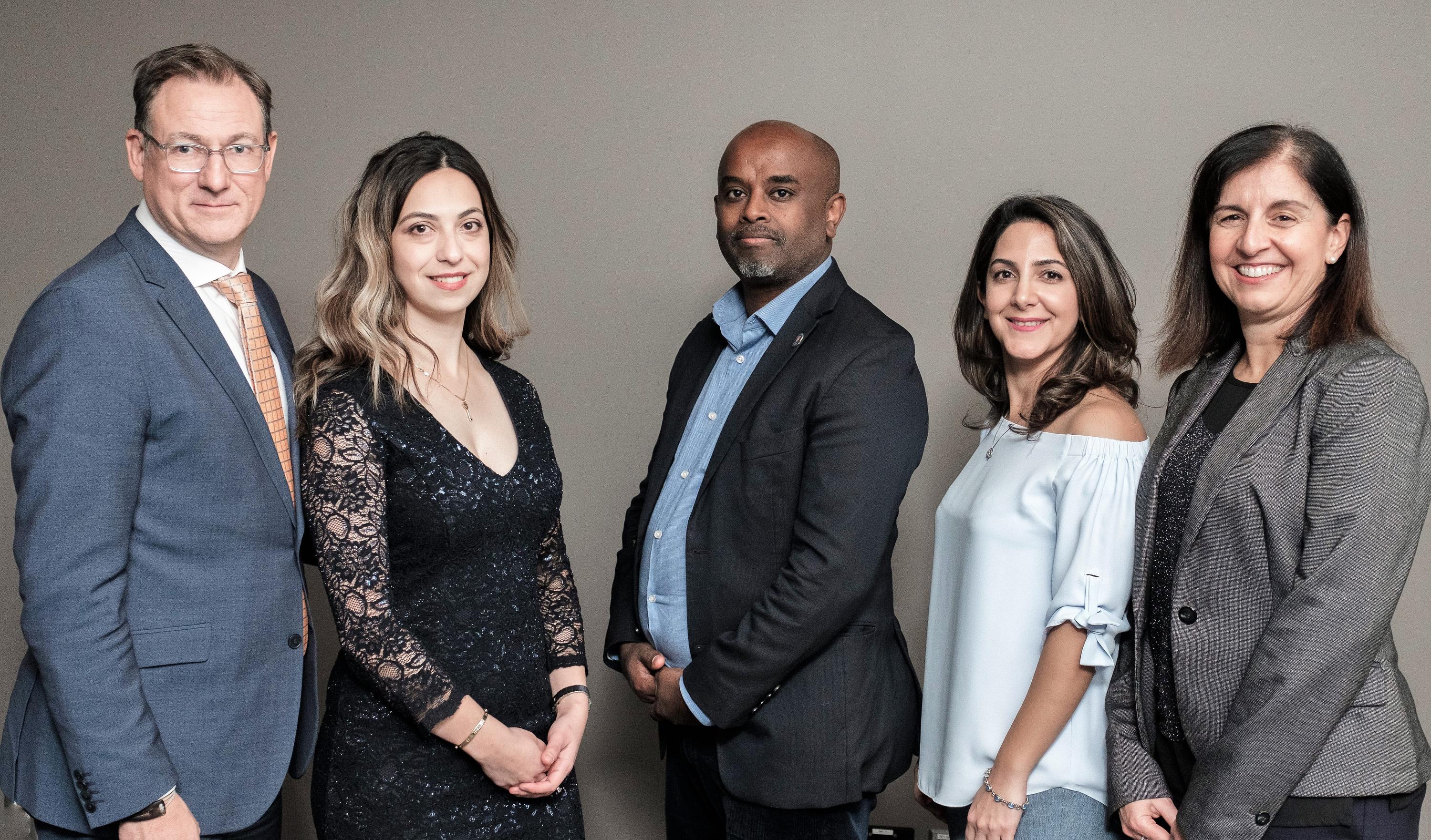 Hydro One representatives (left to right) Greg Lane, Sara Aslanbeigi, Temesghen Bzauayehu, Bahareh Tehrani and Vivian Yoanidis pose together at the 2019 Awards Dinner.