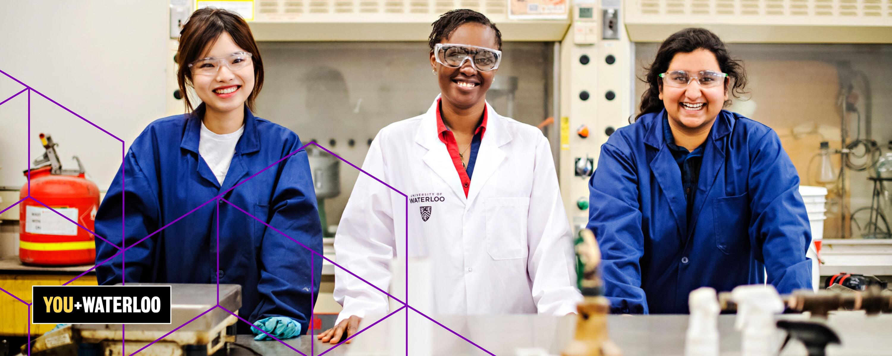 Three female engineering in lab coats