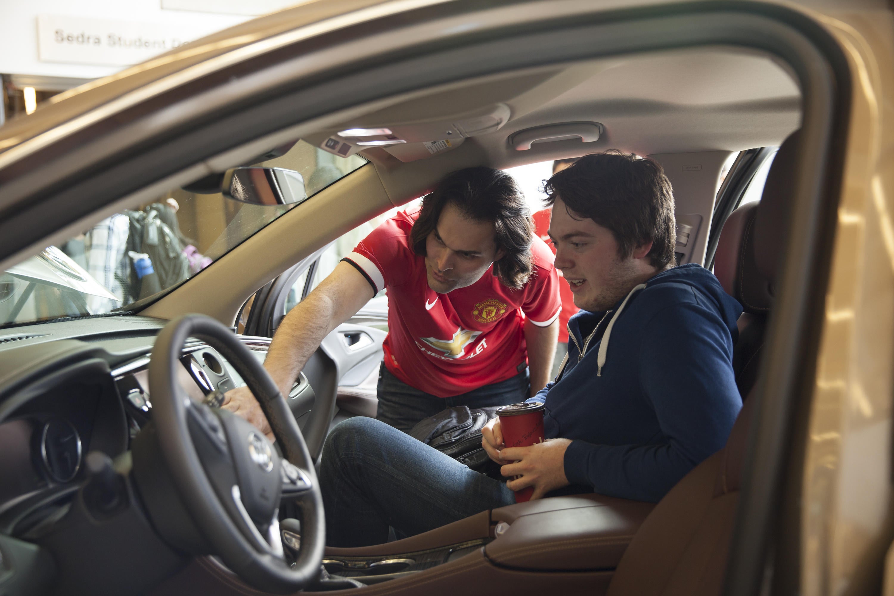 GM Engineer speaking with student