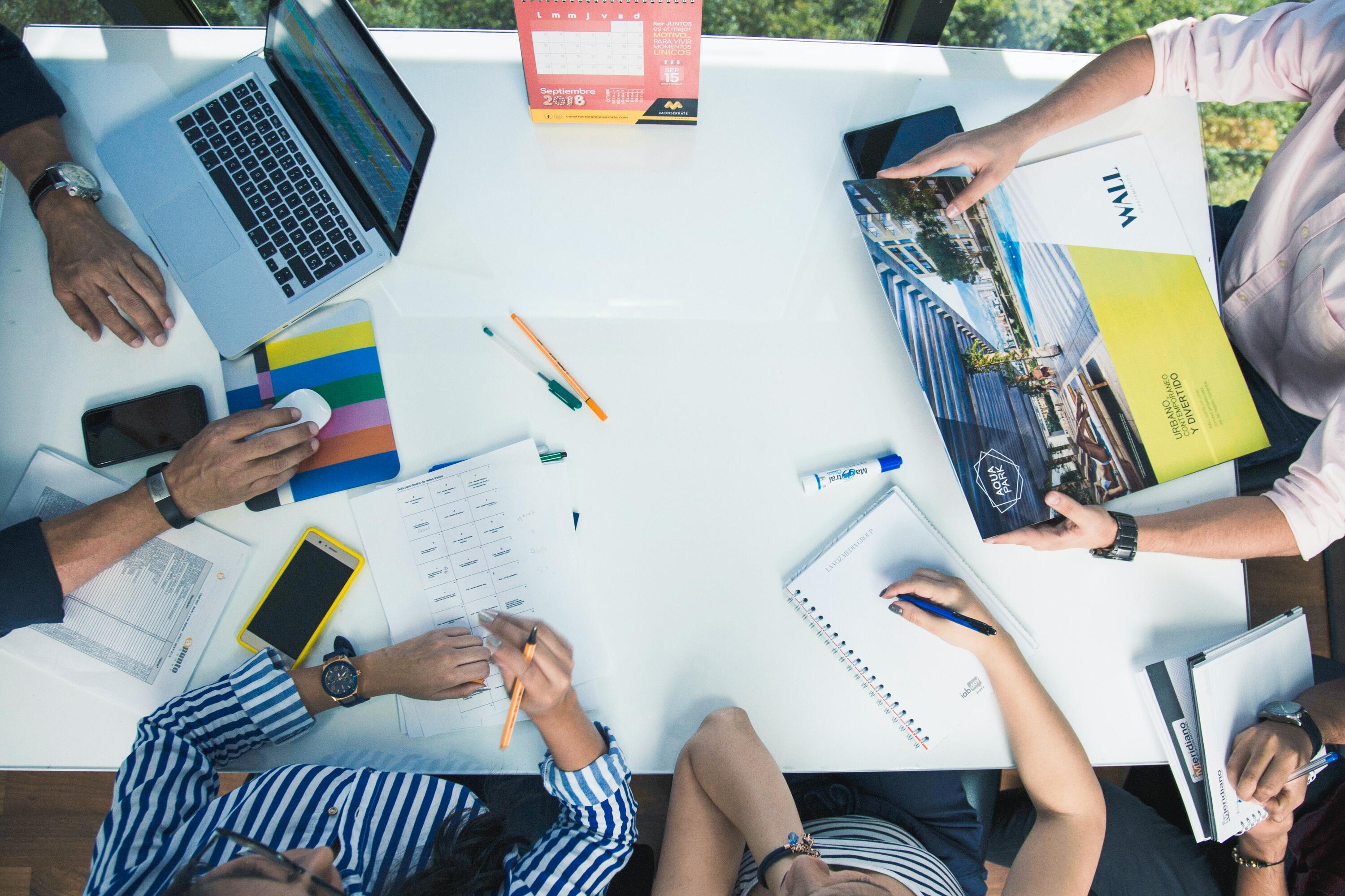 Top view of 5 people working