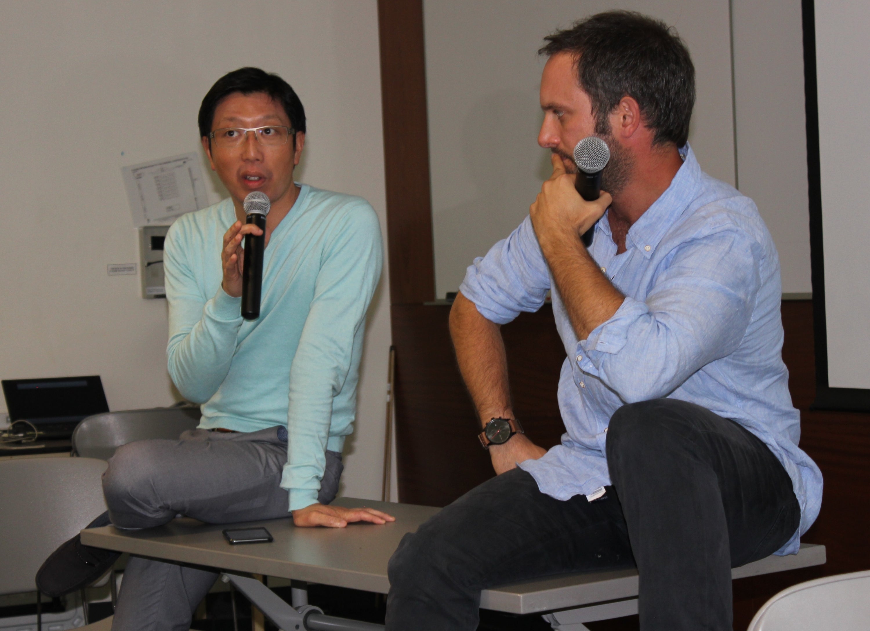 Lyon Wong (left) and serial entrepreneur Jose Daire field questions at the funding announcement event this week.