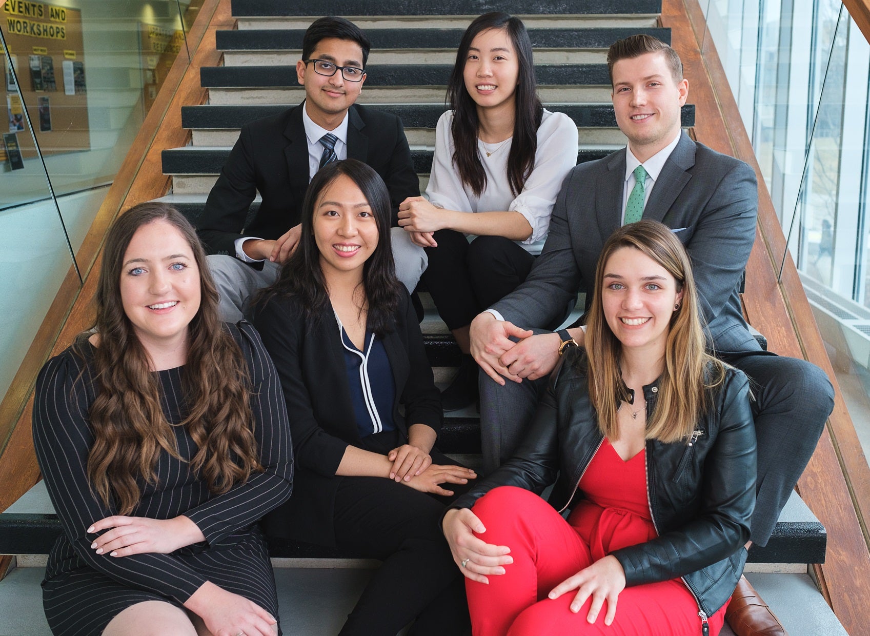 Nathan Duarte of Waterloo Engineering poses with top co-op students from the other five faculties.