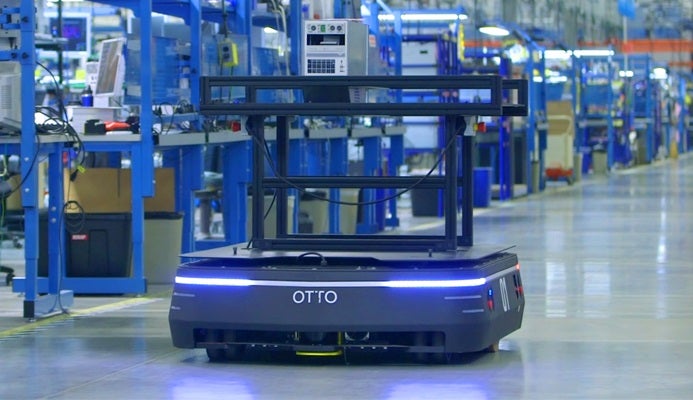 A robot inside a factory.