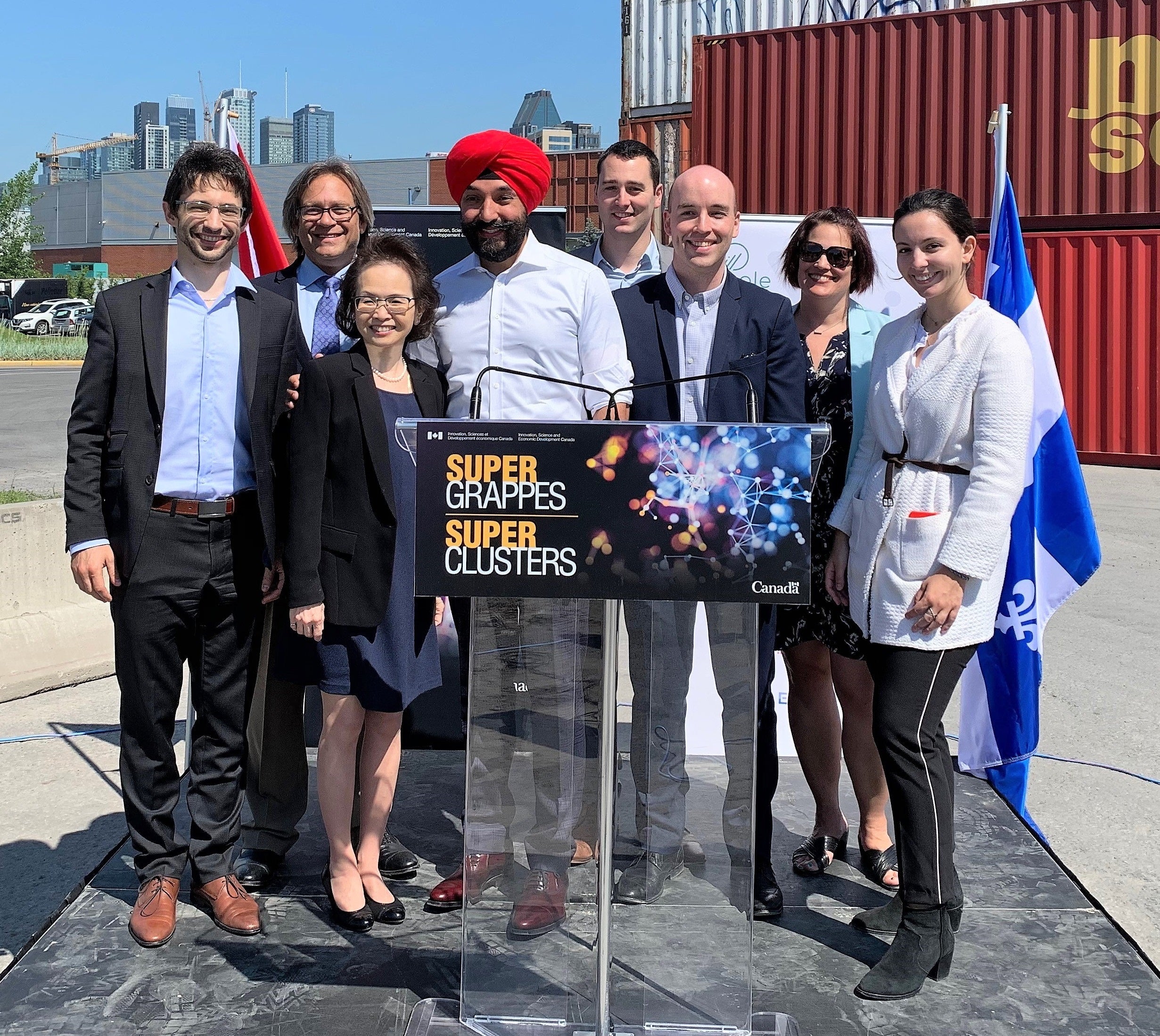 Dean Pearl Sullivan, third from left, joins federal cabinet minister Navdeep Bains and other dignitaries at a scale ai announcement in Montreal.