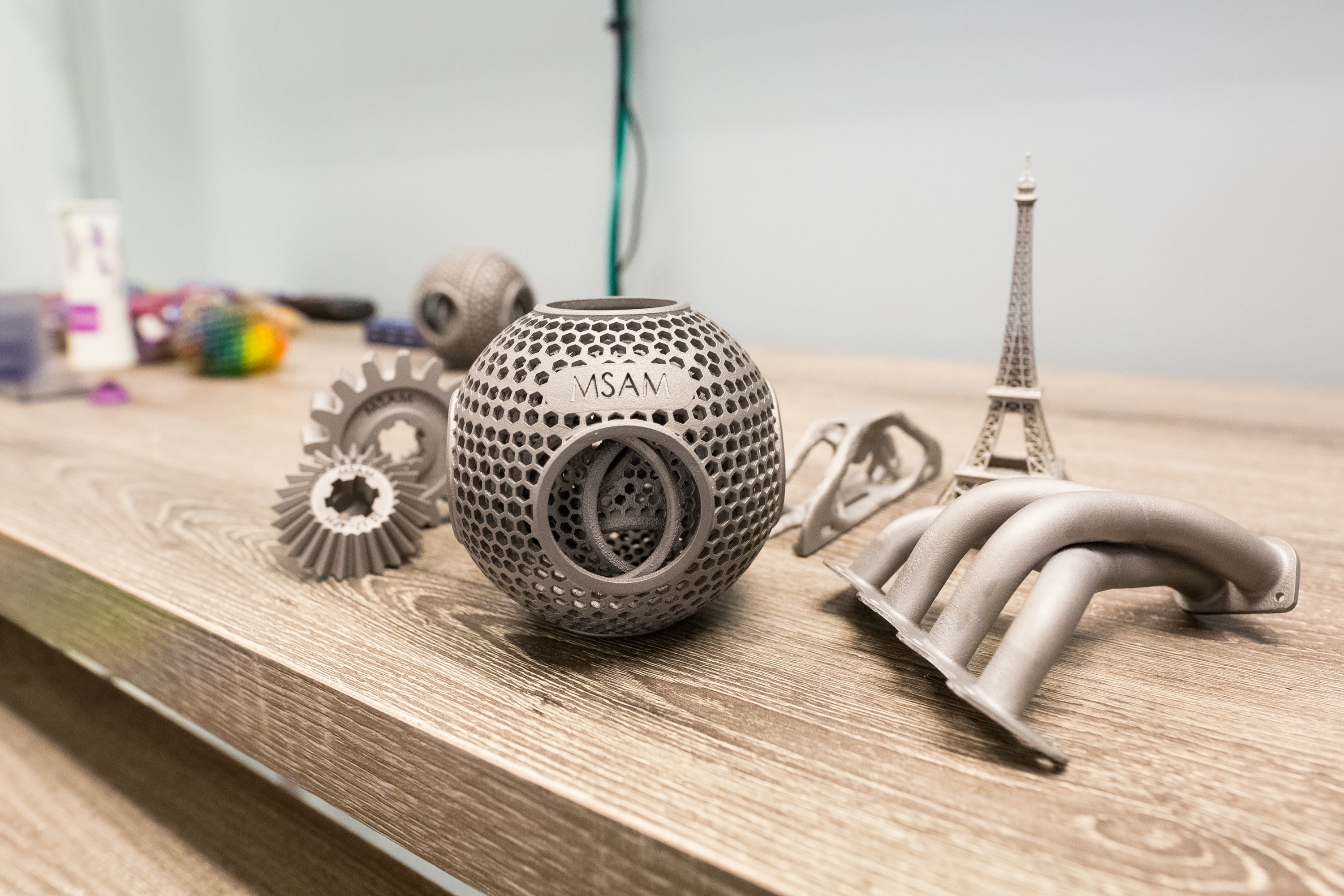 Metal objects that were 3D printed at the Multi-Scale Additive Manufacturing (MSAM) Laboratory at the University of Waterloo.