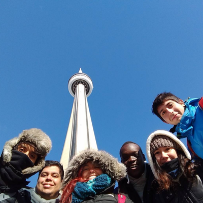 Image of students taking a picture in front of the CN Tower 
