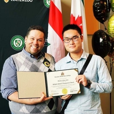 Tim with Student Experience Manager Ryan Connell, receiving his iBASE Student Engagement Award.