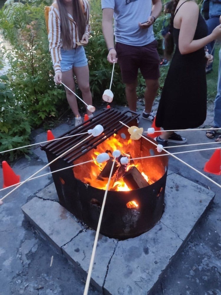 Enjoying a bonfire at one of Renison's popular bonfire parties (a photo by Tim)