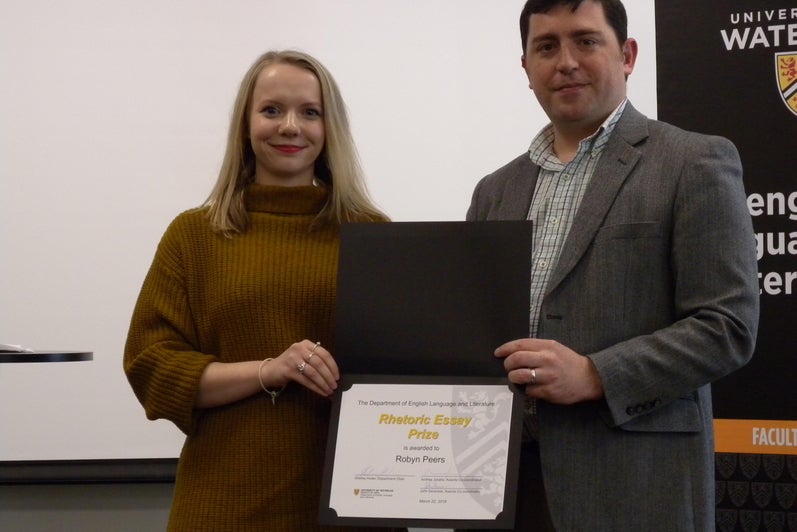 Robyn Peers receives the Rhetoric Essay Prize, MA from John Savarese.