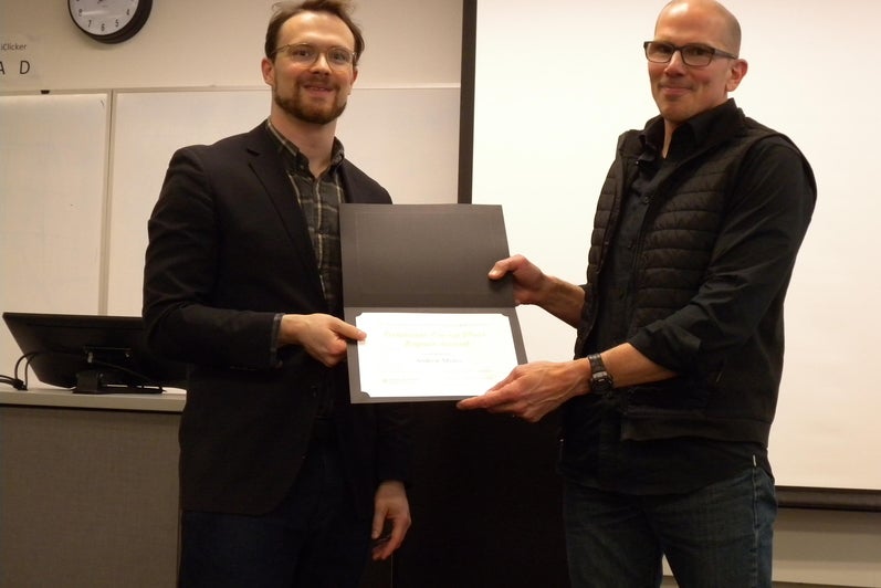 Andrew Myles receives the Graduate Co-op Work Report Award from Marcel O’Gorman