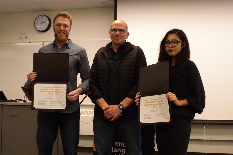 Ian Gibson and Jin Sol Kim receive the Lea Vogel-Nimmo Graduate Professionalization from Marcel O’Gorman