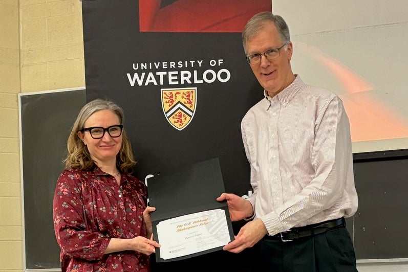 Patricia Fagan receives the G.R. Hibbard Shakespeare Prize from Dr. Ken Graham.