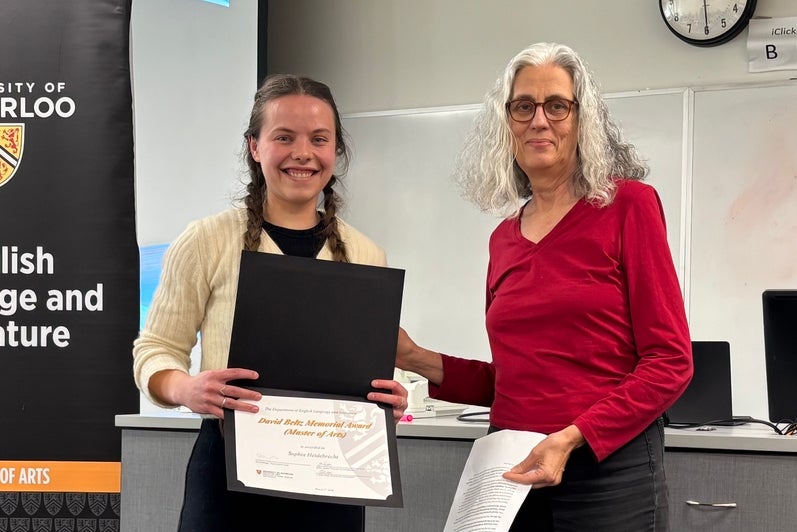 Dr. Kate Lawson presents Sophia Heidebrecht with the David Beltz Memorial Prize MA.
