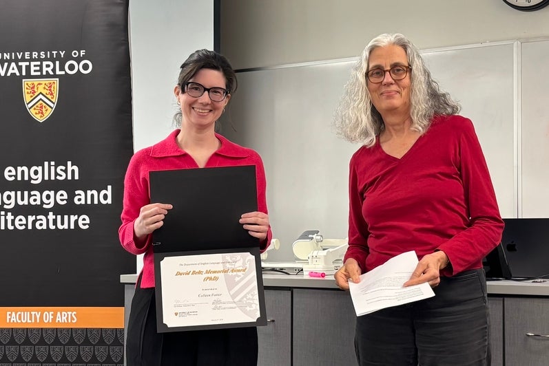 Dr. Kate Lawson presents Colleen Foster with the David Beltz Memorial Prize PhD.