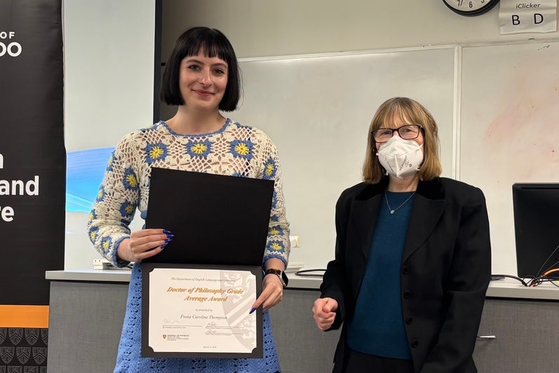 Dr. Carol Acton presents Fiona Thompson with the Doctor of Philosophy Grade Average Award.