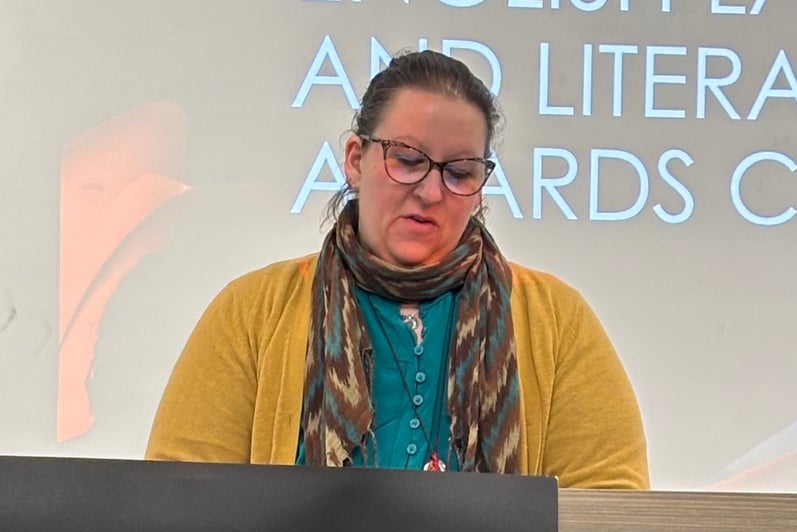 Kellie Chouinard reads from her winning submission.