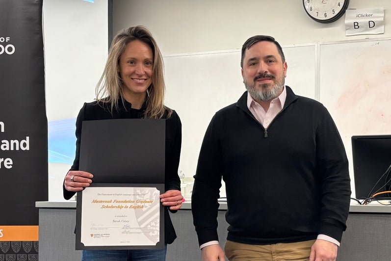 Dr. Carter Neal presents Sarah Casey with the Masternak Scholarship.