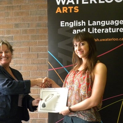 Photo: Dorothy Hadfield presents Claire Matlock with the English 251A Exam Award.