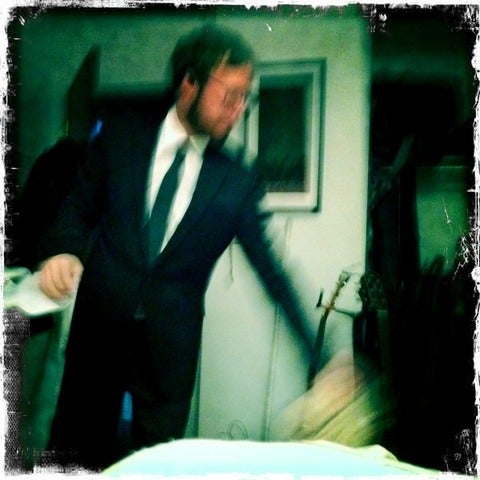 Blurry picture of Kent Aardse in a suit.