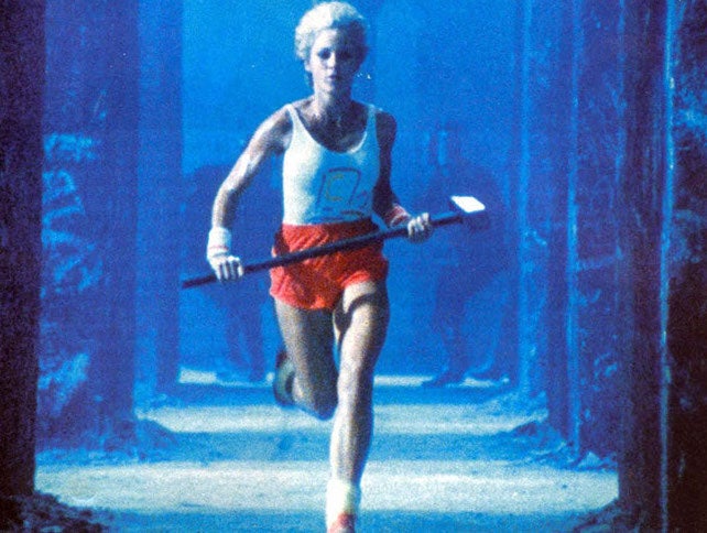 Photo of running woman with hammer (Apple 1984 ad).