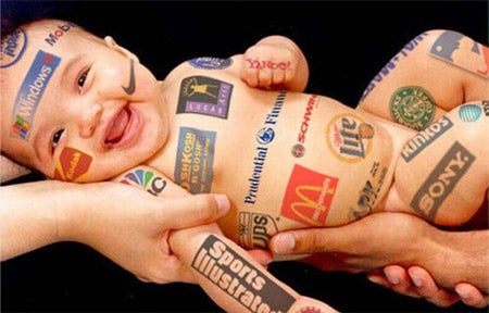 Baby covered in logos.