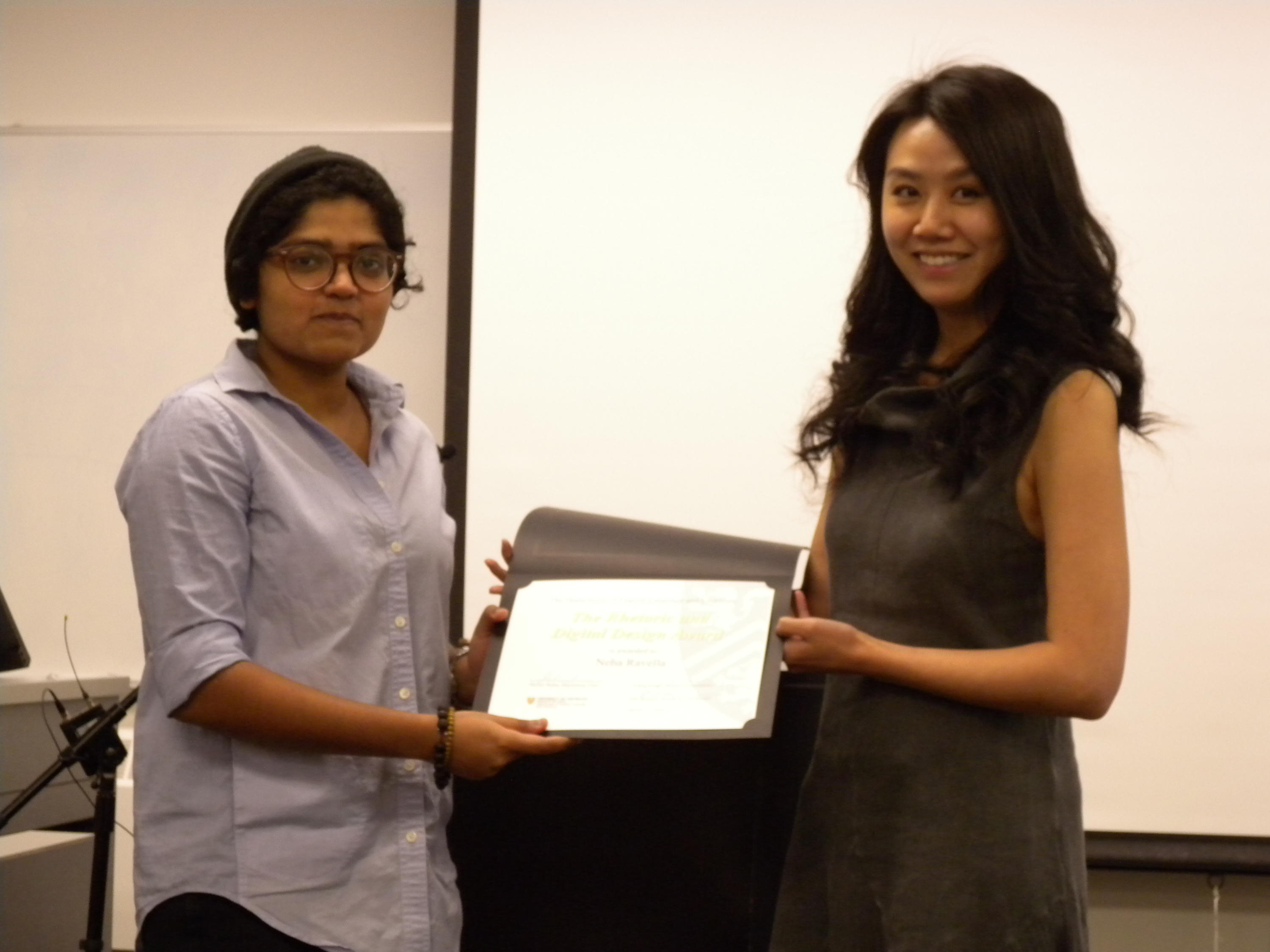 Neha Ravella receives the Rhetoric and Digital Design Award from Lai-Tze Fan