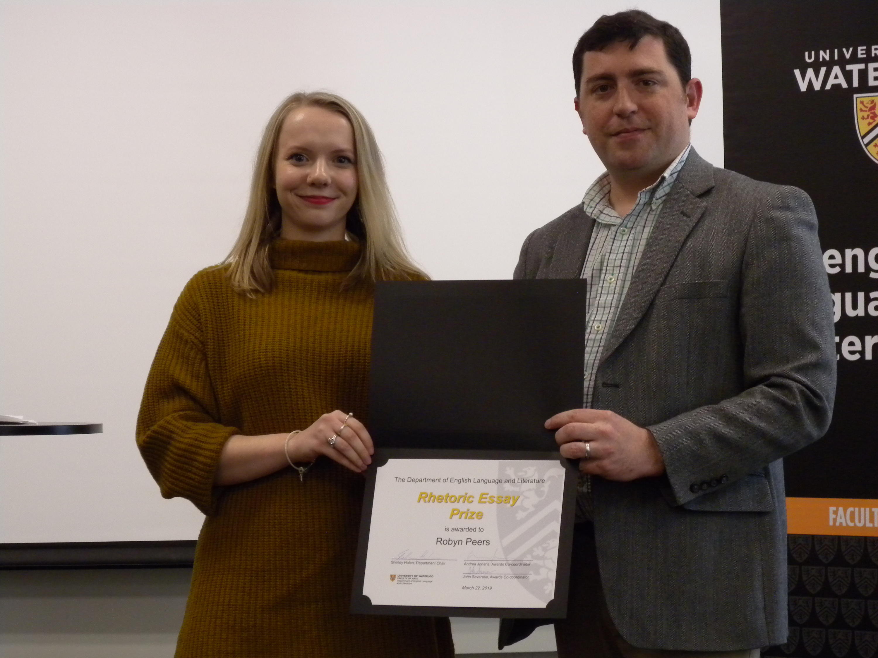 Robyn Peers receives the Rhetoric Essay Prize, MA from John Savarese.