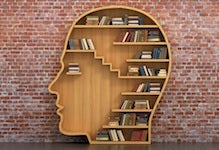 Photo of head-shaped bookshelf.