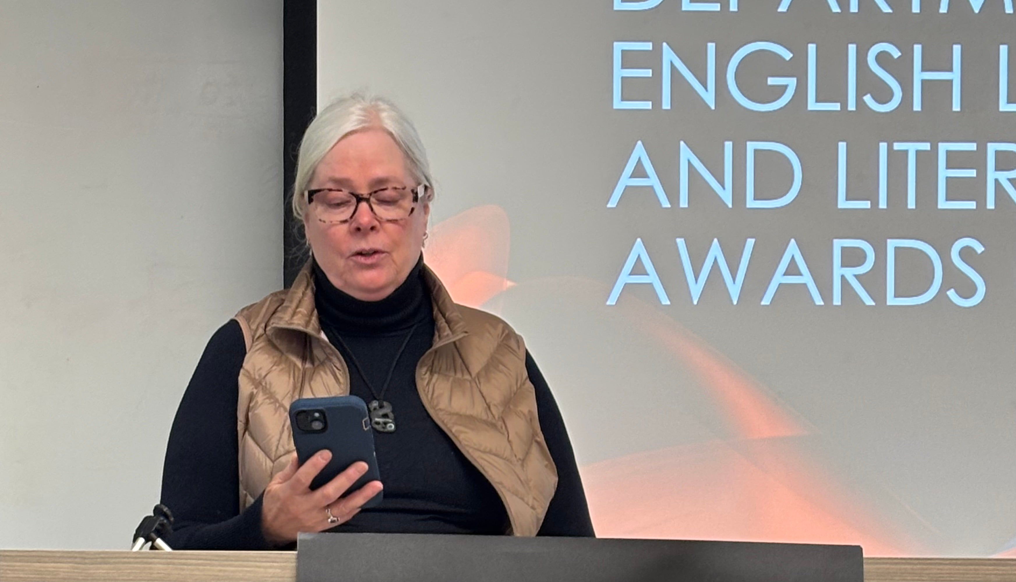 Donor Nancy Mattes introduces the Olive Carrick Scholarship in English.