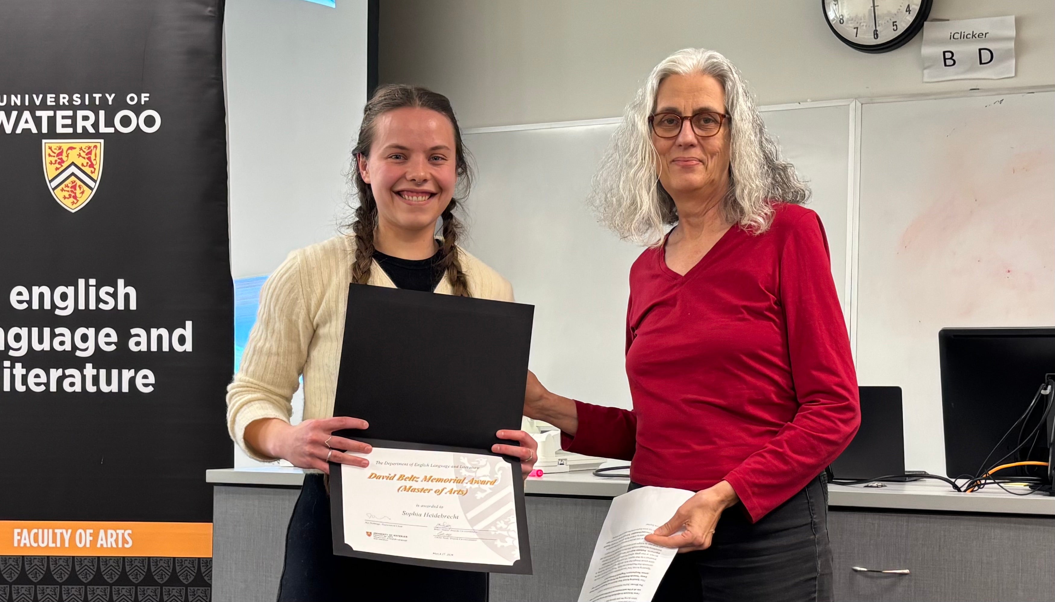 Dr. Kate Lawson presents Sophia Heidebrecht with the David Beltz Memorial Prize MA.