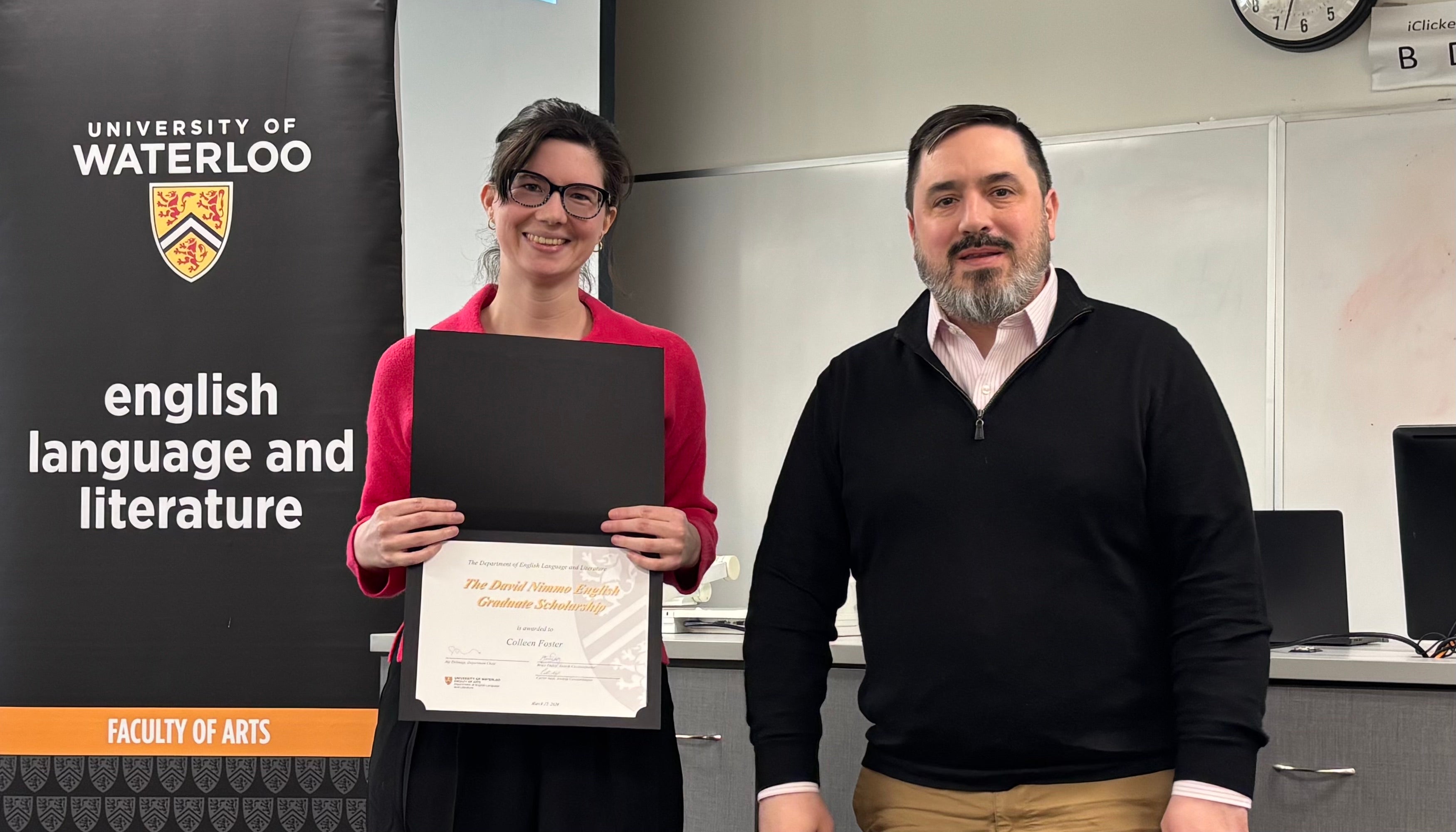 Dr. Carter Neal presents Colleen Foster with the David Nimmo English Graduate Scholarship.